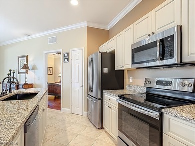 Immaculate RENOVATED and MODERNIZED Ibis 2 model home on the on Herons Glen Golf and Country Club in Florida - for sale on GolfHomes.com, golf home, golf lot