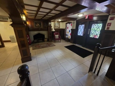 Nestled in a highly desirable International Village community on Inverrary Country Club in Florida - for sale on GolfHomes.com, golf home, golf lot