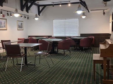 Nestled in a highly desirable International Village community on Inverrary Country Club in Florida - for sale on GolfHomes.com, golf home, golf lot