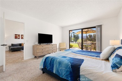 Welcome to 77247 Olympic Way, an exceptional lakefront retreat on Palm Desert Resort Country Club in California - for sale on GolfHomes.com, golf home, golf lot