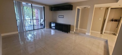 Nestled in a highly desirable International Village community on Inverrary Country Club in Florida - for sale on GolfHomes.com, golf home, golf lot