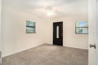 If you have been looking for a spacious home in Carrollwood on Emerald Greens Golf Resort and Country Club in Florida - for sale on GolfHomes.com, golf home, golf lot