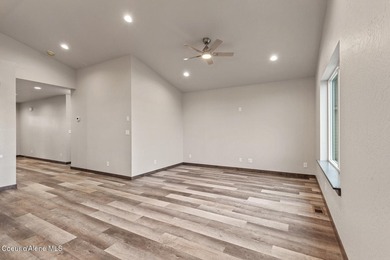 This brand new single-level home is located in a neighborhood on Prairie Falls Golf Club in Idaho - for sale on GolfHomes.com, golf home, golf lot