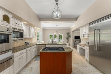 Nestled within the gates of the renowned Isleworth Golf  Country on Isleworth Golf and Country Club in Florida - for sale on GolfHomes.com, golf home, golf lot