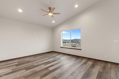 This brand new single-level home is located in a neighborhood on Prairie Falls Golf Club in Idaho - for sale on GolfHomes.com, golf home, golf lot