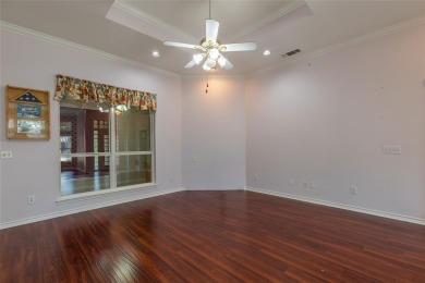 Located in the sought-after, gated community of Pecan Plantation on Pecan Plantation Country Club in Texas - for sale on GolfHomes.com, golf home, golf lot