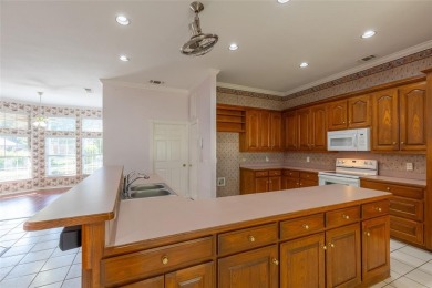 Located in the sought-after, gated community of Pecan Plantation on Pecan Plantation Country Club in Texas - for sale on GolfHomes.com, golf home, golf lot