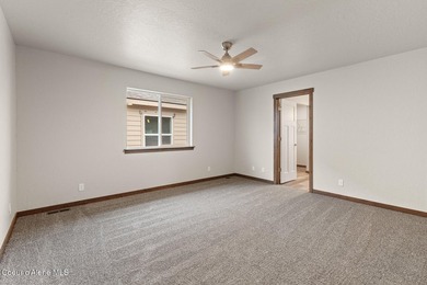 This brand new single-level home is located in a neighborhood on Prairie Falls Golf Club in Idaho - for sale on GolfHomes.com, golf home, golf lot