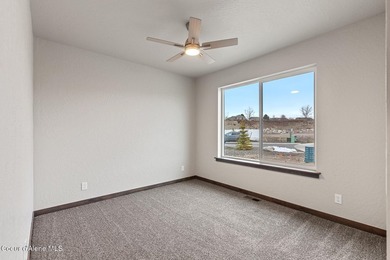 This brand new single-level home is located in a neighborhood on Prairie Falls Golf Club in Idaho - for sale on GolfHomes.com, golf home, golf lot