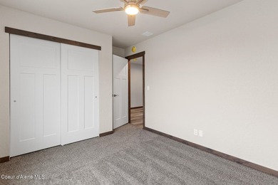 This brand new single-level home is located in a neighborhood on Prairie Falls Golf Club in Idaho - for sale on GolfHomes.com, golf home, golf lot