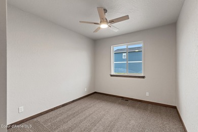 This brand new single-level home is located in a neighborhood on Prairie Falls Golf Club in Idaho - for sale on GolfHomes.com, golf home, golf lot