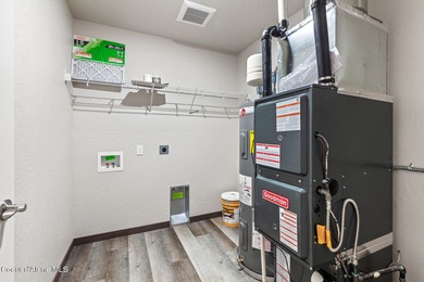 This brand new single-level home is located in a neighborhood on Prairie Falls Golf Club in Idaho - for sale on GolfHomes.com, golf home, golf lot