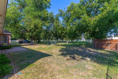Located in the sought-after, gated community of Pecan Plantation on Pecan Plantation Country Club in Texas - for sale on GolfHomes.com, golf home, golf lot