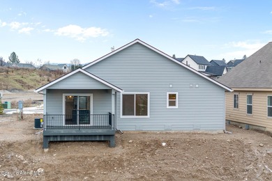 This brand new single-level home is located in a neighborhood on Prairie Falls Golf Club in Idaho - for sale on GolfHomes.com, golf home, golf lot