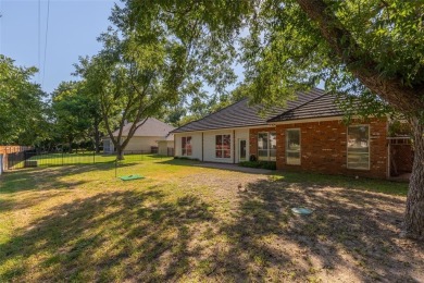 Located in the sought-after, gated community of Pecan Plantation on Pecan Plantation Country Club in Texas - for sale on GolfHomes.com, golf home, golf lot