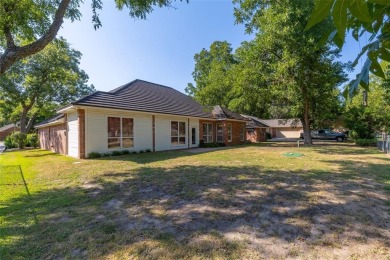 Located in the sought-after, gated community of Pecan Plantation on Pecan Plantation Country Club in Texas - for sale on GolfHomes.com, golf home, golf lot