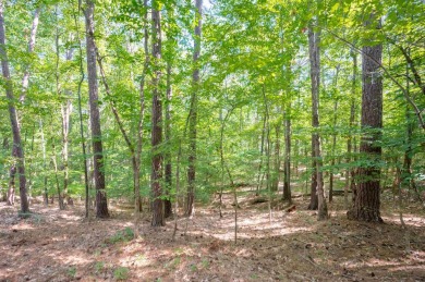 This beautiful, wooded lot on Snug Harbor in The Landing is the on Reynolds Lake Oconee - The Landing in Georgia - for sale on GolfHomes.com, golf home, golf lot