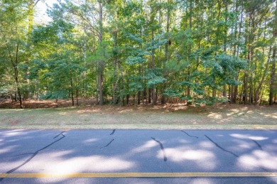 This beautiful, wooded lot on Snug Harbor in The Landing is the on Reynolds Lake Oconee - The Landing in Georgia - for sale on GolfHomes.com, golf home, golf lot