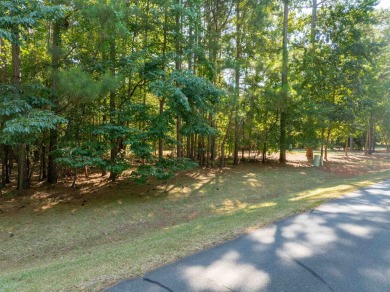 This beautiful, wooded lot on Snug Harbor in The Landing is the on Reynolds Lake Oconee - The Landing in Georgia - for sale on GolfHomes.com, golf home, golf lot