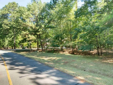 This beautiful, wooded lot on Snug Harbor in The Landing is the on Reynolds Lake Oconee - The Landing in Georgia - for sale on GolfHomes.com, golf home, golf lot