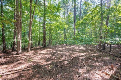 This beautiful, wooded lot on Snug Harbor in The Landing is the on Reynolds Lake Oconee - The Landing in Georgia - for sale on GolfHomes.com, golf home, golf lot