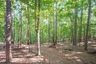 This beautiful, wooded lot on Snug Harbor in The Landing is the on Reynolds Lake Oconee - The Landing in Georgia - for sale on GolfHomes.com, golf home, golf lot