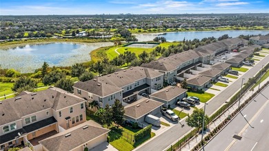 Welcome to this cozy and modern 3-bedroom, 2.5-bath townhouse on Orange County National Golf Center and Lodge in Florida - for sale on GolfHomes.com, golf home, golf lot