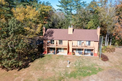 This 2-bedroom townhouse offers the perfect blend of comfort and on White Mountain Country Club in New Hampshire - for sale on GolfHomes.com, golf home, golf lot
