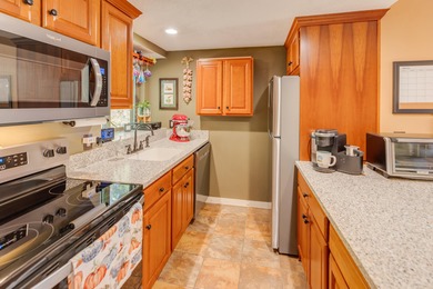 This 2-bedroom townhouse offers the perfect blend of comfort and on White Mountain Country Club in New Hampshire - for sale on GolfHomes.com, golf home, golf lot