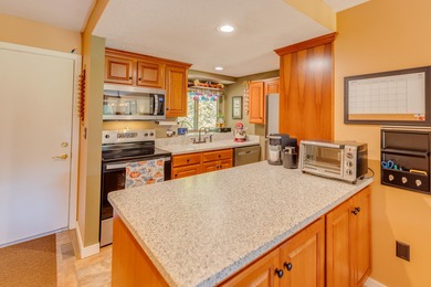 This 2-bedroom townhouse offers the perfect blend of comfort and on White Mountain Country Club in New Hampshire - for sale on GolfHomes.com, golf home, golf lot