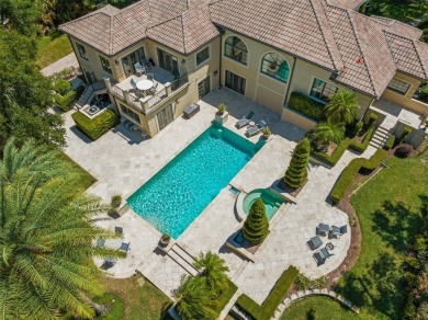Nestled within the gates of the renowned Isleworth Golf  Country on Isleworth Golf and Country Club in Florida - for sale on GolfHomes.com, golf home, golf lot