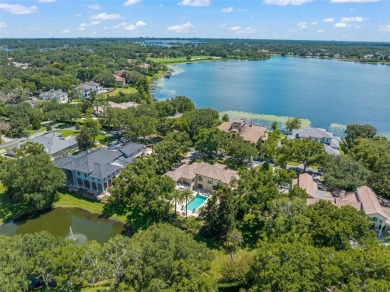 Nestled within the gates of the renowned Isleworth Golf  Country on Isleworth Golf and Country Club in Florida - for sale on GolfHomes.com, golf home, golf lot