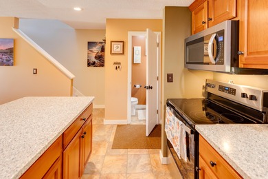 This 2-bedroom townhouse offers the perfect blend of comfort and on White Mountain Country Club in New Hampshire - for sale on GolfHomes.com, golf home, golf lot