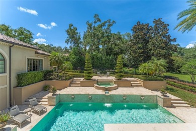 Nestled within the gates of the renowned Isleworth Golf  Country on Isleworth Golf and Country Club in Florida - for sale on GolfHomes.com, golf home, golf lot