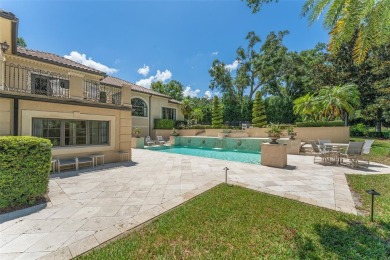 Nestled within the gates of the renowned Isleworth Golf  Country on Isleworth Golf and Country Club in Florida - for sale on GolfHomes.com, golf home, golf lot