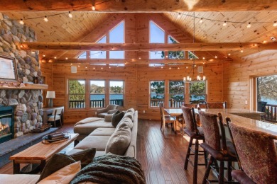 Lakefront Log Home – Private Beach & Docks on Lake Camelot on Sand Valley Golf Course in Wisconsin - for sale on GolfHomes.com, golf home, golf lot
