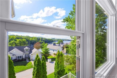 Welcome to this wonderful lake view townhome community located on Seasons Ridge At Four Seasons in Missouri - for sale on GolfHomes.com, golf home, golf lot