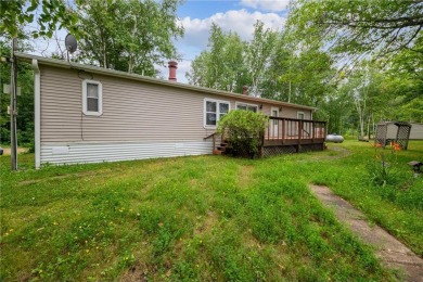 Turn the key and start enjoying lake life from this fully on Hardwoods Golf Club At Mille Lacs in Minnesota - for sale on GolfHomes.com, golf home, golf lot