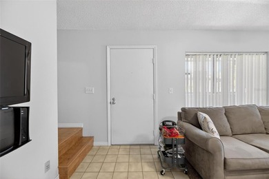 Turn-key and move-in ready! Welcome to this bright 2-bedroom, 1 on Cove Cay Country Club in Florida - for sale on GolfHomes.com, golf home, golf lot