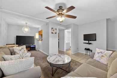 Turn-key and move-in ready! Welcome to this bright 2-bedroom, 1 on Cove Cay Country Club in Florida - for sale on GolfHomes.com, golf home, golf lot