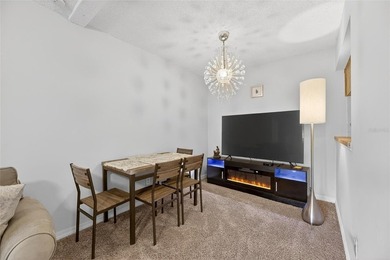 Turn-key and move-in ready! Welcome to this bright 2-bedroom, 1 on Cove Cay Country Club in Florida - for sale on GolfHomes.com, golf home, golf lot