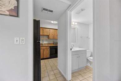 Turn-key and move-in ready! Welcome to this bright 2-bedroom, 1 on Cove Cay Country Club in Florida - for sale on GolfHomes.com, golf home, golf lot