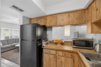 Turn-key and move-in ready! Welcome to this bright 2-bedroom, 1 on Cove Cay Country Club in Florida - for sale on GolfHomes.com, golf home, golf lot