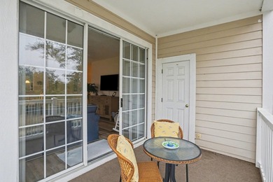 Welcome to this bright and beachy 2-bedroom, 2-bath end-unit on  in South Carolina - for sale on GolfHomes.com, golf home, golf lot
