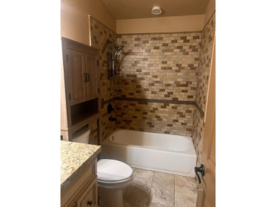 Welcome to 338 Flora Dr, nestled in the sought-after Golf Course on Spring Creek Golf Course in Nevada - for sale on GolfHomes.com, golf home, golf lot