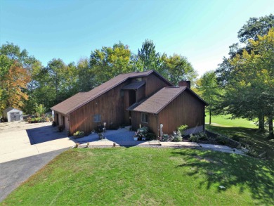 Enjoy your summer on the golf course with this stunning home on McCauslin Brook Golf and Country Club in Wisconsin - for sale on GolfHomes.com, golf home, golf lot