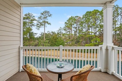 Welcome to this bright and beachy 2-bedroom, 2-bath end-unit on  in South Carolina - for sale on GolfHomes.com, golf home, golf lot