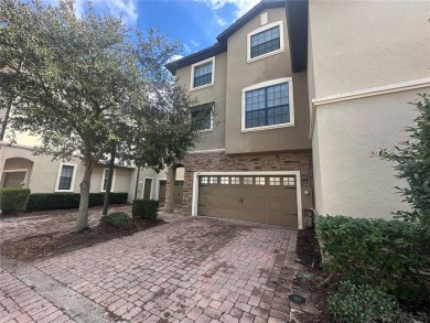 Short Salee check out this beautiful  townhome that has loads of on ChampionsGate Golf Resort in Florida - for sale on GolfHomes.com, golf home, golf lot