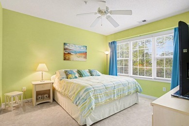 Welcome to this bright and beachy 2-bedroom, 2-bath end-unit on  in South Carolina - for sale on GolfHomes.com, golf home, golf lot