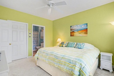 Welcome to this bright and beachy 2-bedroom, 2-bath end-unit on  in South Carolina - for sale on GolfHomes.com, golf home, golf lot